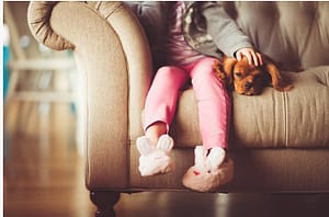 child with a pet 